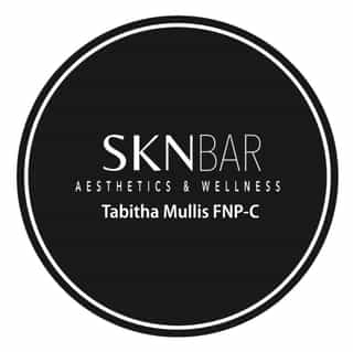 Skn Bar Aesthetics & Wellness logo